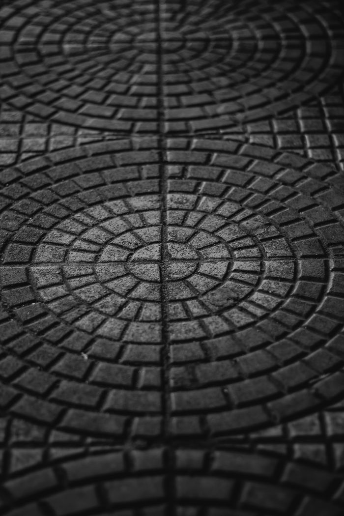 Black and white abstract pattern of tiled pavement in Teófilo Otoni, Brazil.